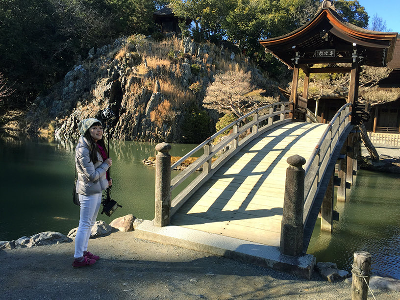 Kana Oiwa holding GoPro camera at Eihoji Temple, Tajimi